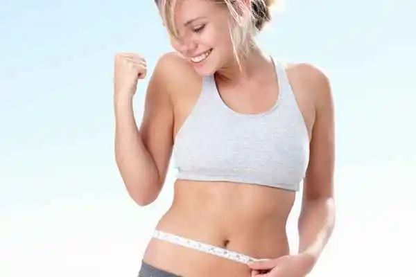 woman happy after fat reduction treatment West Yorkshire