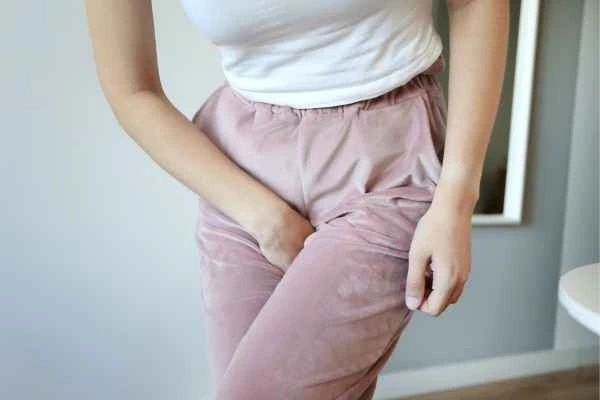 older woman running to the toilet because of urinary incontinence West Yorkshire